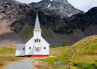 The white whalers' church in Grytviken, set against the mountains of South Georgia