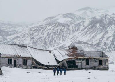 Expedition group in front of an abandoned whaling station