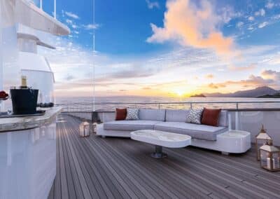 Sun deck on a ship with a white lounge area
