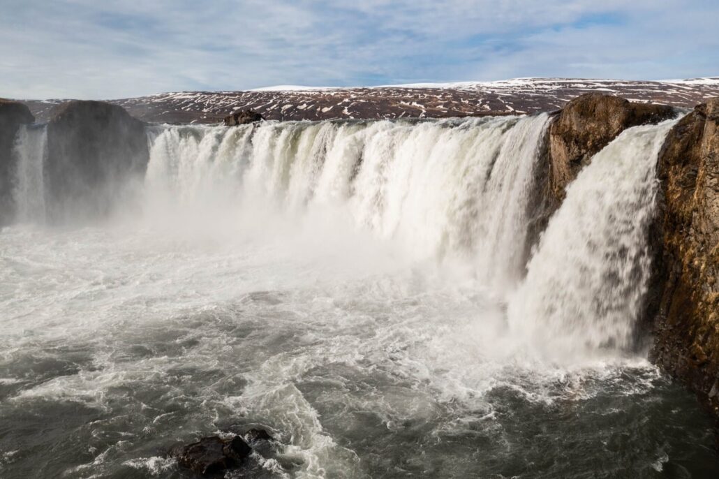 Close-up of the wide cascades of Goðafoss Waterfall in Iceland