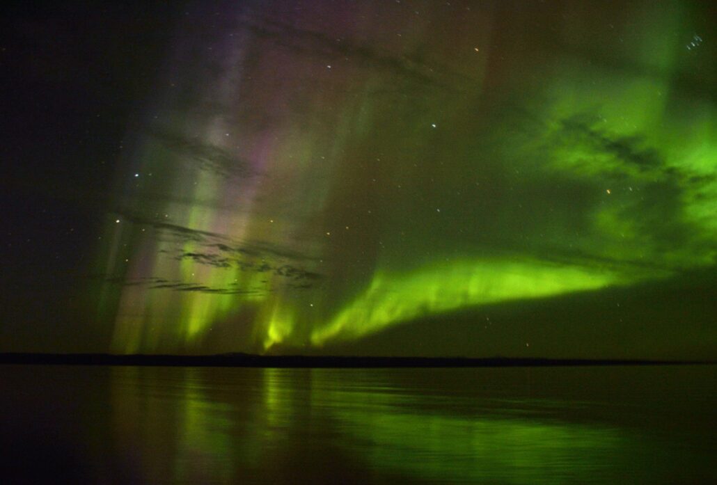 Aurora over the Rypefjord in Scoresby Sund, East Greenland