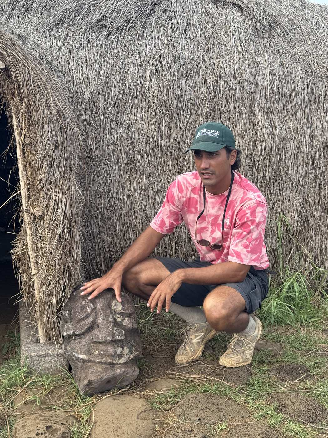 A Rapa Nui artist displays a hand-carved moai statue