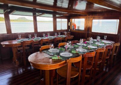 A set table on board the Amazon Dolphin featuring regional dishes