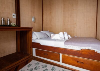 Standard cabin on the Belle Amazon with a wide double bed