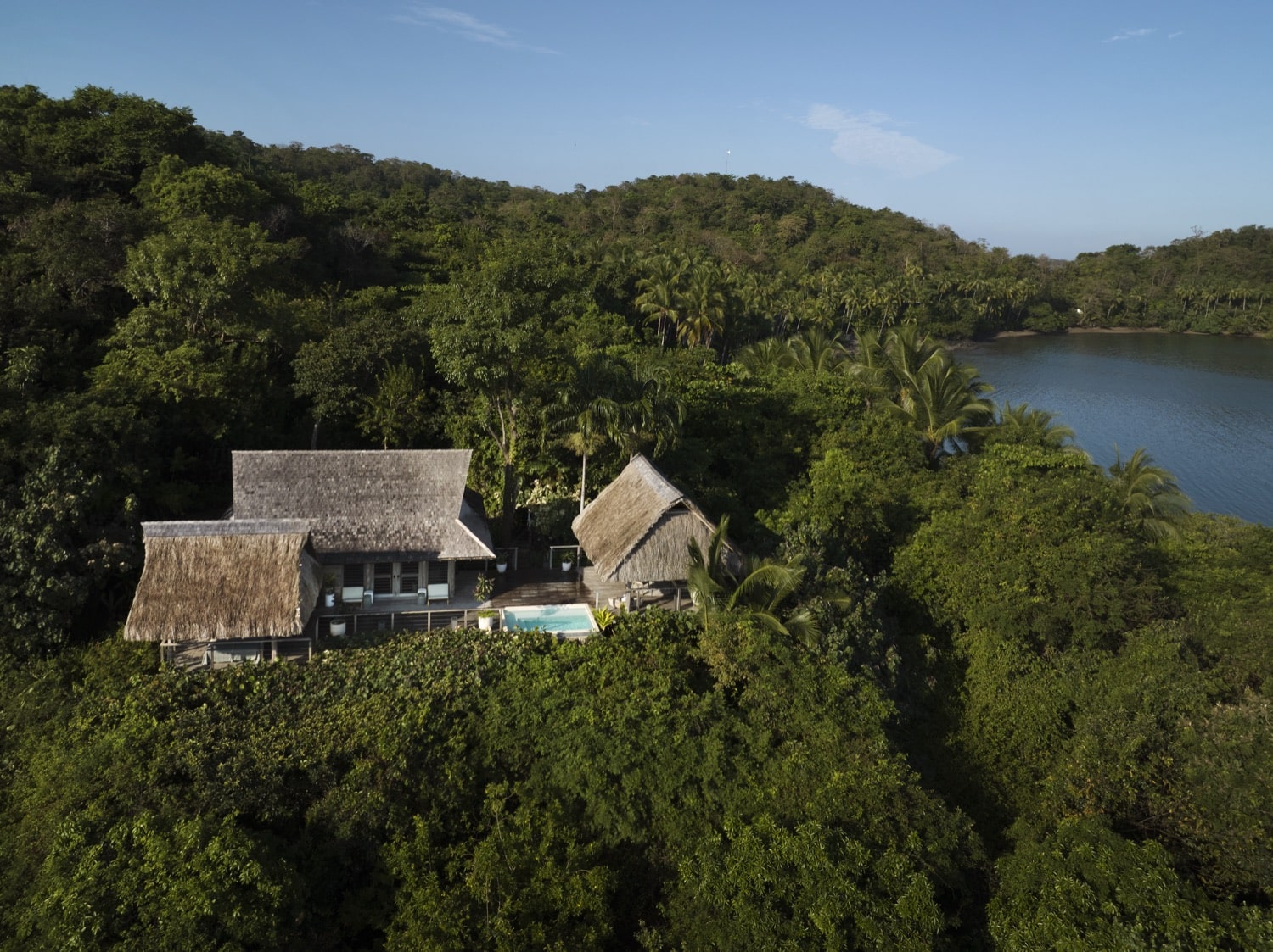 The Casita Mirador with a pool, nestled among the trees overlooking the bay