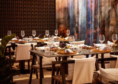 Tables set with wine glasses in the AmaMagdalena restaurant